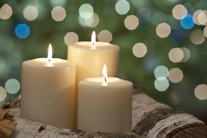 candels on cedar logs